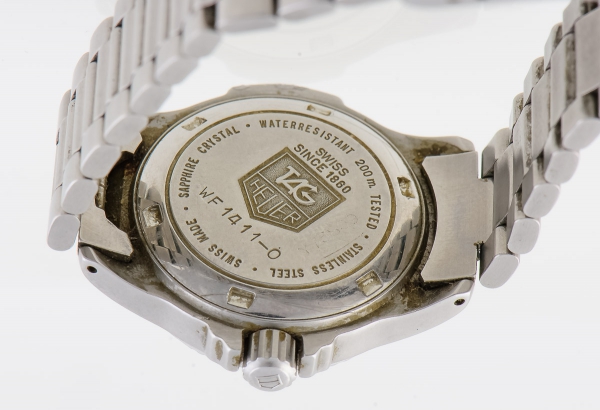 TAG HEUER. Rel gio feminino su o de pulso com calend r