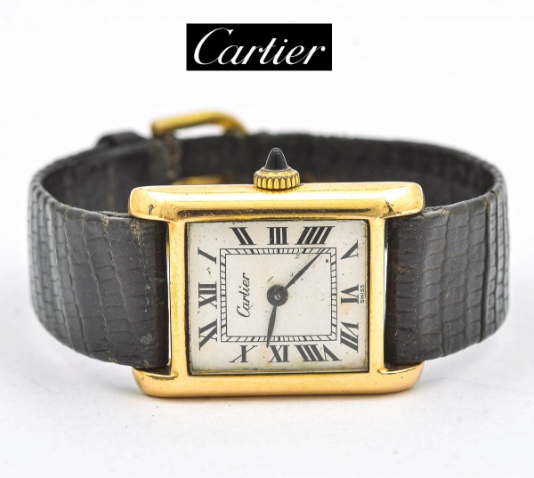 CARTIER. Rel gio feminino su o de pulso da marca