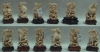 Raro conjunto com 12 animais em alegoria esculpidos em marfim que simbolizam o "Horóscopo Chinês". Base em madeira. Alt. 11cm.