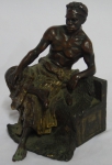 FRANZ BERGMAN (ÁUSTRIA, 1898-1963). "O Príncipe Etíope", escultura em bronze patinado e policromado. Alt.: 15cm. Assinado. Artista com inúmeras obras reproduzidas no "Berman Bronze". Reproduzido com foto no catálogo.