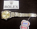 ROLEX. Relógio masculino suiço de pulso com calendário da marca Rolex. Caixa e pulseira original em aço. Mecanismo necessitando de revisão.