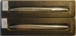 BREITLING. Duas canetas italianas esferográficas. Caixa espessurada a prata da marca "Breitling". Estojo original.