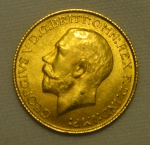Libra em ouro 22k do período "George V", datada de 1916. Peso: 8g.