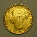 Libra em ouro 22k do período "Vitoriano", datada de 1886. Peso: 8g.