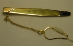 Antigo prendedor de gravatas em ouro 18k - 750mls contrastado. Peso: 6,1g.