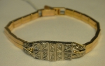 Antiga pulseira "tijolinho" em ouro 18k, ouro branco e 14 diamantes.