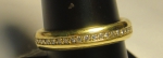 H. STERN. Magnífica aliança em ouro 18k - 750mls contrastado, circundada com 47 brilhantes. Marca da grife. Aro 20.