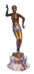 FERDINAND PREISS (ALEMANHA, 1882  1943). "Charleston Dancer" escultura art deco em bronze dourado e policromado. Base em mármore marrom e bege rajado. Alt.: 37cm. Esta obra encontra-se reproduzida na pag.282 no livro de "Bryan Clatey". Reproduzido com foto no catálogo.