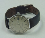 OMEGA. Relógio masculino suíço de pulso automático com calendário dos anos 60 da marca "Omega", modelo "Seamaster de Ville". Caixa em aço. Funcionando.