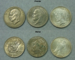 Três dólares americanos em prata datados de 1922, 1972 e 1976.