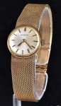 Relógio feminino suíço de pulso da marca "Eterna". Caixa e pulseira originais em ouro 18k-750mls contrastado. Peso: 43,1g. Mecanismo a corda. Funcionando.
