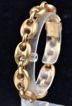 Pulseira italiana em ouro 18k - 750mls contrastada com elos no padrão "Gucci". Peso: 29,3g.