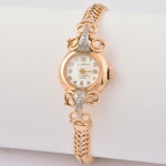 Relógio feminino suíço de pulso da marca "Classic". Caixa e pulseira em ouro 18k-750mls contrastado, ouro branco e 2 diamantes. Peso:16,8g.