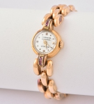 Relógio feminino suíço de pulso da marca "Pronto Automatic". Caixa e pulseira em ouro 18k-750mls contrastado. Peso: 22,8g. Funcionando.