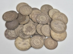 Trinta e sete moedas brasileiras em prata do "Império Brasileiro", séc. XIX, sendo 32 moedas de 1.000 reis e 5 moedas de 2.000 reis. Peso: 550g.