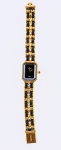 CHANEL - PARIS. Relógio feminino suíço de pulso da marca "Chanel". Caixa e pulseira em plaque d'or. Mecanismo a quartz. (Mecanismo necessitando de revisão).