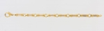 Pulseira italiana em ouro 18k-750mls contrastada decorada com canudilhos. Peso: 23,3g.