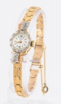 Relógio feminino suíço de pulso da marca "Eska". Pulseira e caixa em ouro 18k-750mls contrastado, guarnecido com 16 diamantes. Funcionando. Peso: 16,5g.