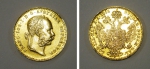 Moeda austro-húngara em ouro 22k no valor de 1 ducado, datada de 1915. Peso: 2,8g.