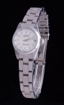ROLEX. Relógio feminino suíço de pulso com calendário da marca "Rolex". Caixa e pulseira em aço. Diam. do mostrador: 2cm. Movimento automático. Funcionando.