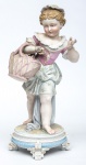 Figura em biscuit policromado, representando "Menina com cesto de flores". Alt.: 37cm. Alemanha-1900. (Em função da fragilidade, este lote só poderá ser enviado para fora do estado através de transportadora especializada).