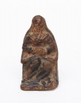 NOSSA SENHORA DA PIEDADE (PIETÁ). Raríssima imagem miniatura em madeira com resquícios de policromia. Alt.: 5cm. Minas-Séc.XVIII.
