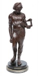 EMILE BRUCHON (FRANÇA, 1806-1895). "Le Mecanicien", escultura em petit bronze patinado. Base em mármore negro rajado. Alt.: 43cm.