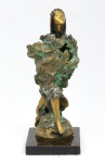 TONNY (BRASIL, SÉC. XX). "Vênus Estilizada", escultura em bronze patinado e dourado. Base em mármore negro rajado. Alt.: 47cm.