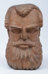 NICOLA, JAIME. (PERNAMBUCO, SÉC.XX). "São Pedro", cabeça esculpida em madeira. Alt.: 42cm. Assinado e datado (1987).