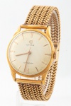CYMA. Relógio masculino suíço de pulso da década de 50, da marca "Cyma". Caixa e pulseira em ouro 18k. Movimento a corda. Funcionando. Diam.: 3,2cm. Peso: 62,3g.