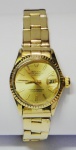 ROLEX. Relógio feminino suíço de pulso com calendário da marca "Rolex", modelo "Presidente". Caixa e pulseira em ouro 18k - 750 mls contrastado. Movimento automático. Peso: 56,7g. Funcionando.