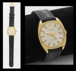 BUCHERER. Relógio masculino suíço de pulso com calendário da marca "Bucherer", década de 60/70. Caixa em plaque d'or. Movimento automático. Diam.: 3,3cm. Funcionando.