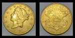Moeda americana em ouro 22k, no valor de 20 dólares, datada de 1900. Peso: 33,5g.