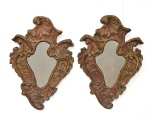 Par de antigos florões em madeira patinada com resquícios de ouro ducado no estilo "D. José I", Brasil - séc. XIX. Parte central espelhada. Medida: 51 X 35.